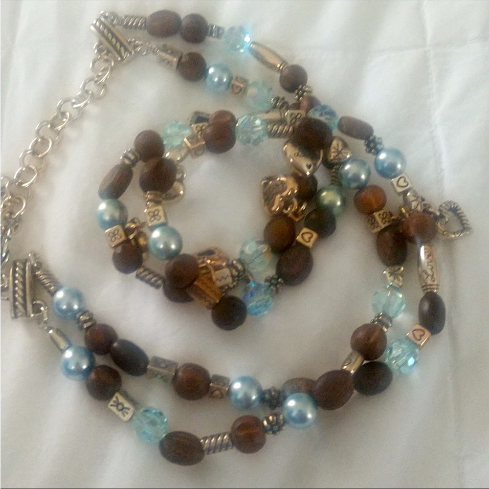 Brighton necklace and earring set with cloth bag included.